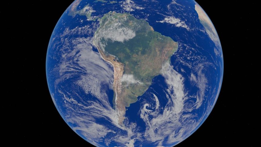 Imagem de satélite da América do Sul vista do espaço, cercada pelo oceano.